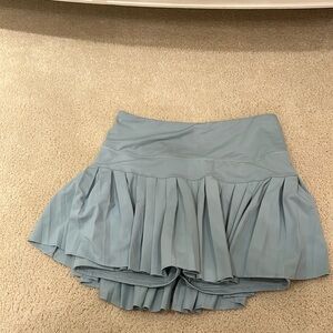 Gold hinge green tennis skirt